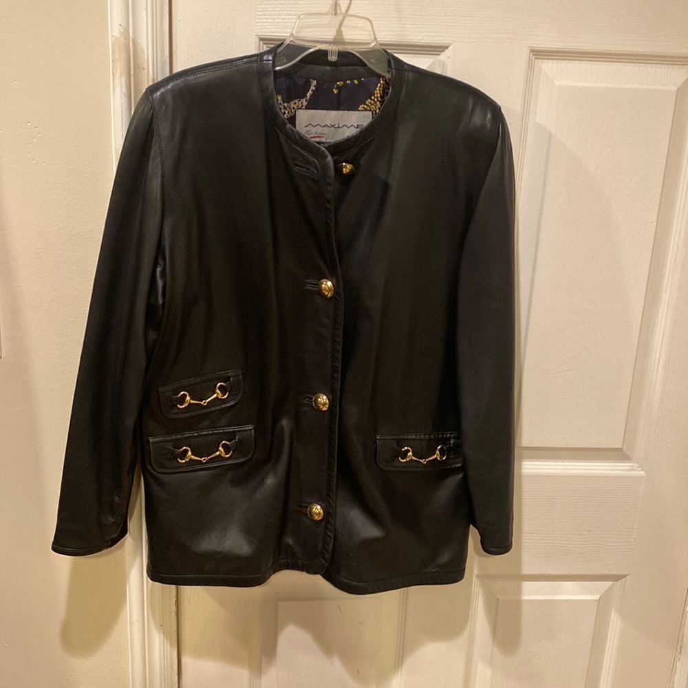 Beautiful vintage leather jacket I’m not sure but it could be a Gucci
